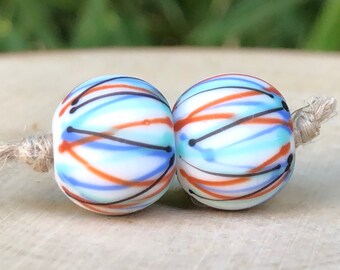 Set of 2 matte lampwork glass beads in white, periwinkle blue, brown, aquamarine, black, line decor, artisanal beads