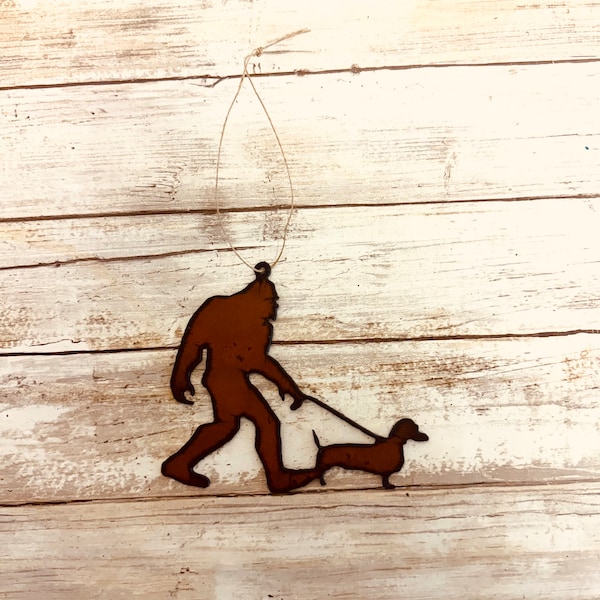 Bigfoot walking Weiner dog rustic magnet or ornament