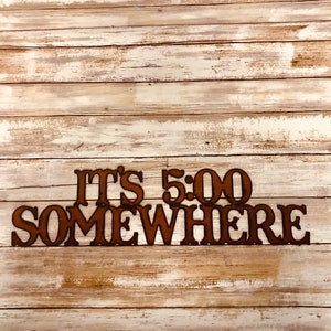 It's 5:00 Somewhere sign Made out of rusted recycled metal