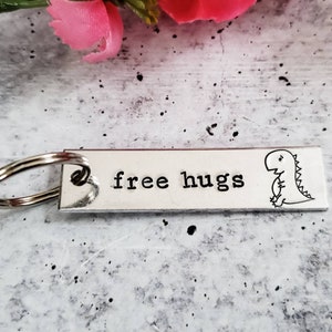 FREE HUGS Bar Keychain - Personalized T-Rex Dinosaur Keychain - Key Holder for Kids and Teens - Cute Gift for Her - Present for Him
