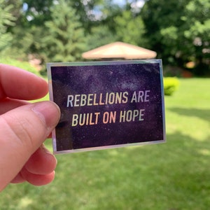 Rebellions are built on hope holographic sticker
