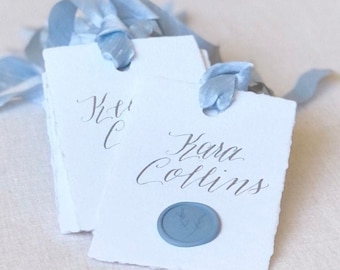 Garden Party Wedding Place Cards with Dusty Blue Wax Seal and Ribbon