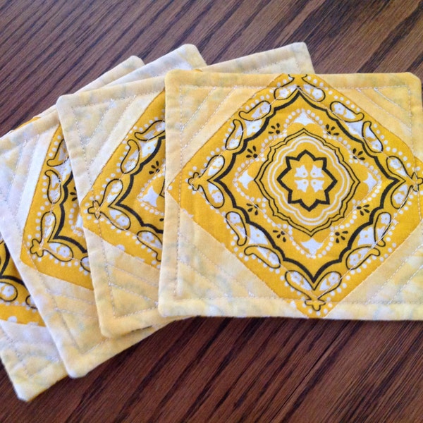 Four Sunny Yellow Reverse Appliquéd Coasters with Machine Quilted Accents