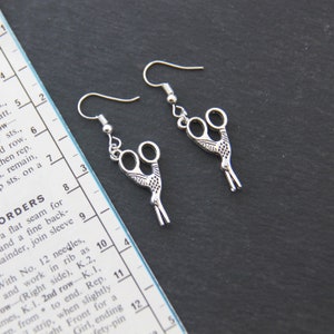 Stork Scissor Earrings. Silver tone.