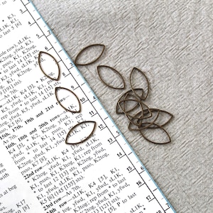 12 Antique Bronze Marquise Stitch Markers - fits needles up to 8mm needle (US 11)