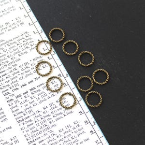 Antique Bronze Rope Stitch Markers: fits 10mm (US15) needles. Set of 10.