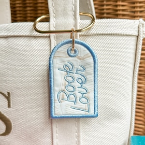Book Lover Embroidered Keychain, Bookish Bag Charm, Embroidered Bag Tag, Bookworm Gift, Reader Gift, Book Club Gift, Oval Carabiner Clip