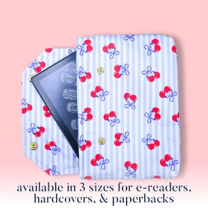 Protective padded book sleeve secure double snap closure. Kindle Sleeve, Paperwhite Oasis, Colorsoft, EReader cherry red blue bow american