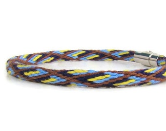Woven kumihimo friendship bracelet, with 24 strand brown and blue diamond pattern and stainless steel magnetic clasp