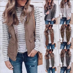 May include: A collection of brown, green, and animal print vests with sherpa lining. The vests are shown on models wearing striped shirts and jeans.