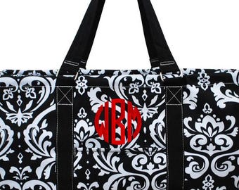 Opvouwbare canvas reistas met monogram en luipaardprint.