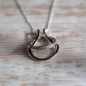 A beautiful Horseshoe Ring Holder Pendant Necklace in available Sterling Silver, 18K Yellow and Rose Gold Vermeil. This ring keeper is available a variety of lengths.