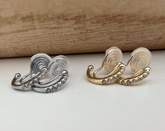 PAINLESS! U-shaped spiral clip-on earrings with half-circle and mini round zircon stones, gold plated. Comfortable ear clips.