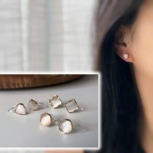 Clips d'oreilles œil de chat blanc crème