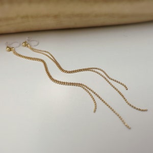 ロング INVISIBLE CLIPS イヤリング ダブルチェーン ミニ ゴールド タッセル ビーズ ノンホール耳に快適なチェーン イヤー クリップ。