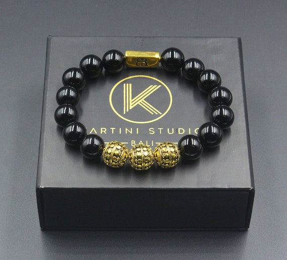 Buy the Black Lava and Gold Beaded Mens Bracelet | JaeBee Jewelry