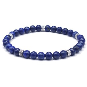 May include: A blue gemstone beaded bracelet with silver accents. The bracelet is made of small, round beads and has a simple, elegant design.