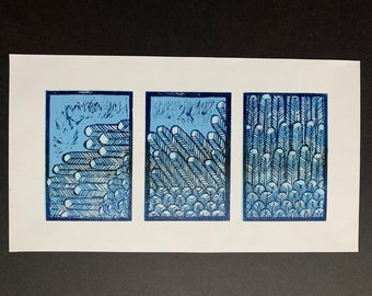 From the Northwest. Blue feather triptych, hand carved and printed, original woodblock print