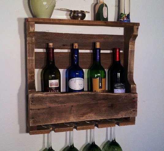 A coat of bright paint and an old wine rack is repurposed as  storage/display for stuf…