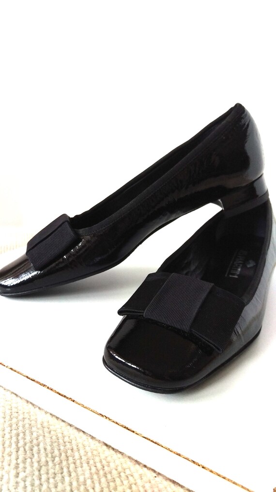 black patent leather shoes with bow