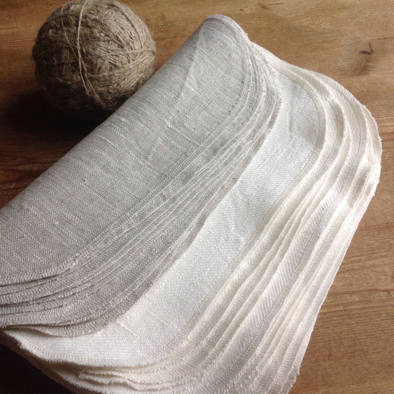 small linen towels in natural white or oatmeal. Unpaper towels to replace disposable towels