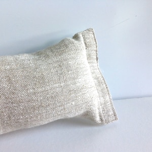 Rough textured natural linen draught blocker in oatmeal with velcro closure