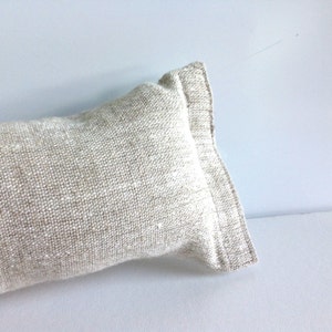 Rough textured natural linen draught blocker in oatmeal with velcro closure