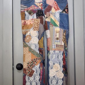 Totally patched jeans with vintage fabric and lace patchwork front and back  36x30 mid to high rise