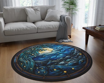 May include: Round area rug with a night sky design. The rug features a full moon, swirling blue and teal water, and a dark border. The design is reminiscent of a stained glass window. The rug is placed on a hardwood floor.