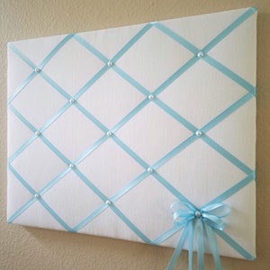 White and blue fabric memo / photo / vision board