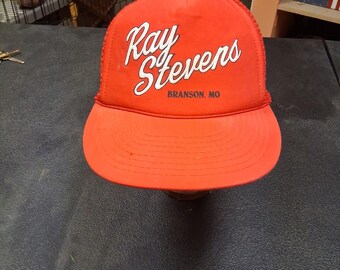 Gorra de camionero vintage Ray Stevens Branson MO con cierre ajustable y malla. Gorra promocional de música country.