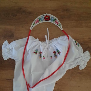 Blouses, Coronets, Hairbands and Baby Suits - decorated with Hungarian folk art motifs