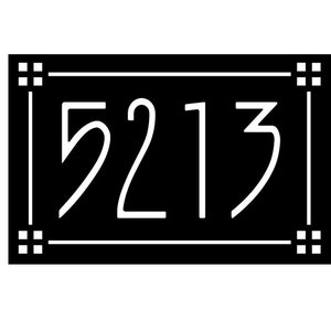 May include: Black and white house number sign with the number 5213 in a white font.