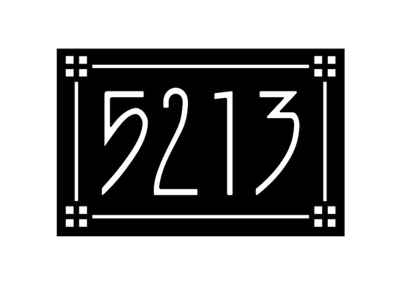 May include: Black and white house number sign with the number 5213 in a white font.