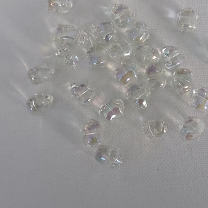 pig beads (5) iridescent glass