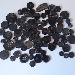 Black buttons, button lot (100)