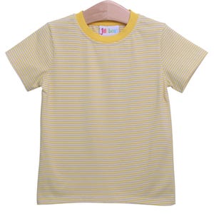 May include: A yellow and white striped short-sleeved t-shirt with a yellow ribbed crew neck. The shirt has the text "Jell Bean" in rainbow colors on the neckband.