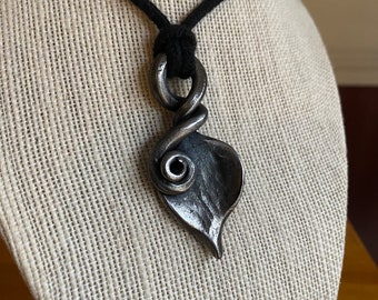 Pendant hand forged