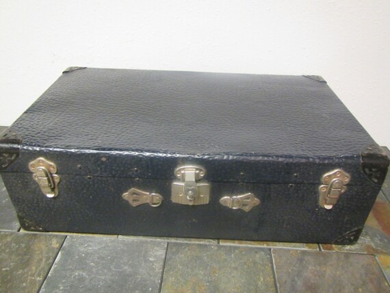 black metal suitcase
