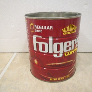 FOLGERS COFFEE Can* 48 oz. Regular grind coffee tin , mountain grown * 3 pound . * Good advertising tin ** Fg 48-regrnd-5