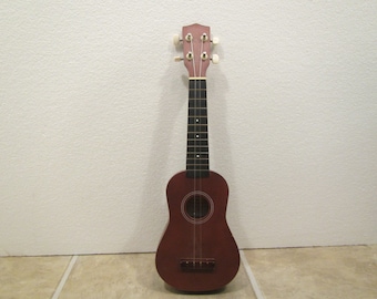 Asheville small childs Guitar , stringed musical instrument ** model WEV