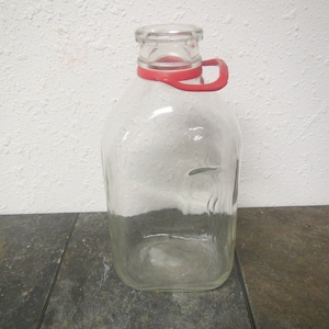 Half Gallon Glass Milk Bottle with red plastic handle,  milk container