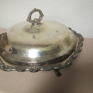 vintage 3 legged SILVERPLATED SERVING BOWL with cover .  6 sided outer rim;  11 1/2 inches across