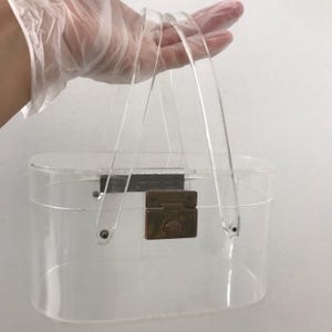 Vintage 1950’s Oval Shaped Basket Style All Clear  Lucite Purse with Brass Buckle Closure