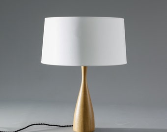 Scandinavian table lamp with turned wood body and cotton shade
