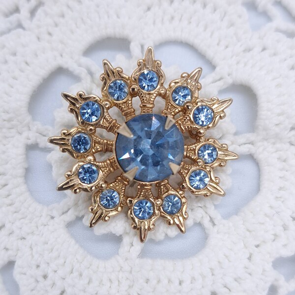 Vintage "BLUE ICE" Crystal Brooch/Pin. Faceted Rhinestone Prong Set in a Gorgeous Snow Flake Designed Gold Tone Metal Filigree Setting.