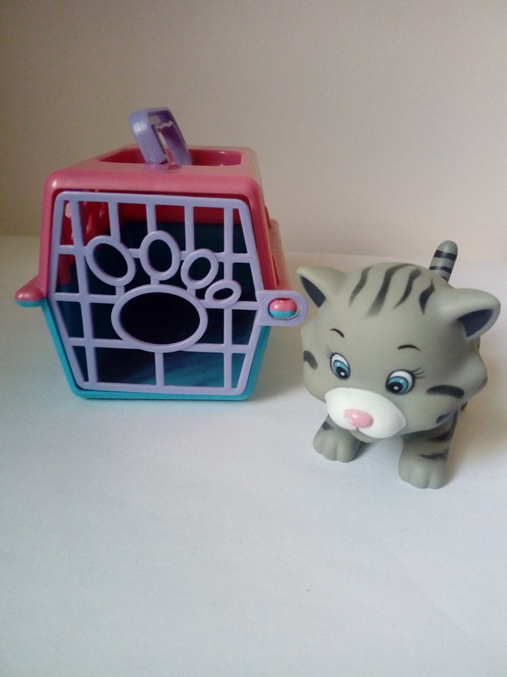 toy cat and carrier