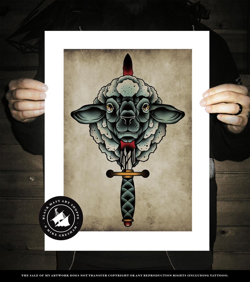 May include: A black and white traditional tattoo style illustration of a sheep's head pierced by a dagger. The sheep has a red bow tie. The background is a vintage parchment paper texture. The image includes the text "BLACK MAST ART SHOP" and "MIKE GRESHAM".