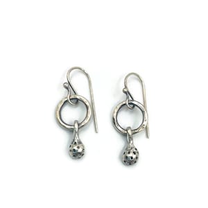 Tiny sterling silver raindrop earrings.