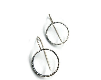 Hammered sterling silver circle earrings.